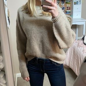 tan sweater